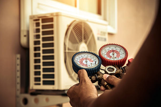 Professional Heat Pump Repair technician working in Pioneertown, CA